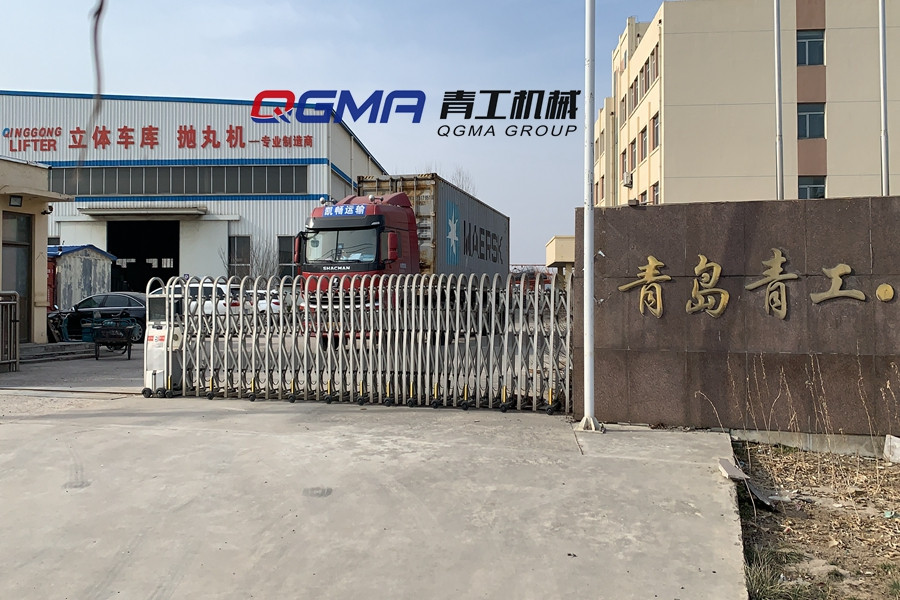 尊龙凯时机械钢管抛丸机自动上下料装置装箱发往印尼